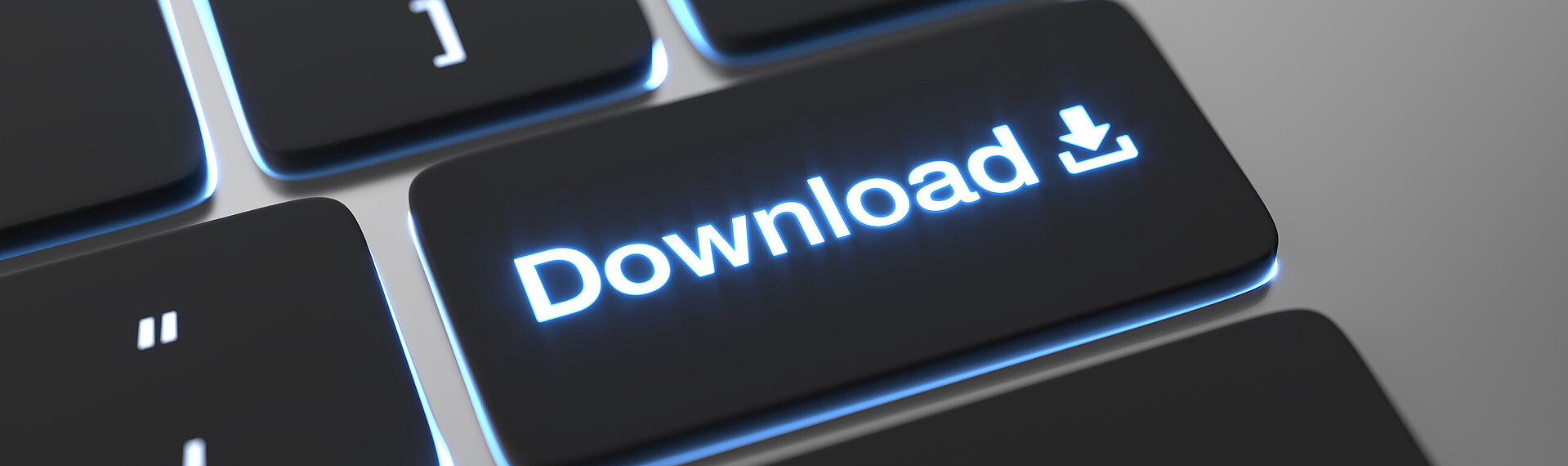 Tastatur vom MacBook auf dessen Return-Taste Download steht